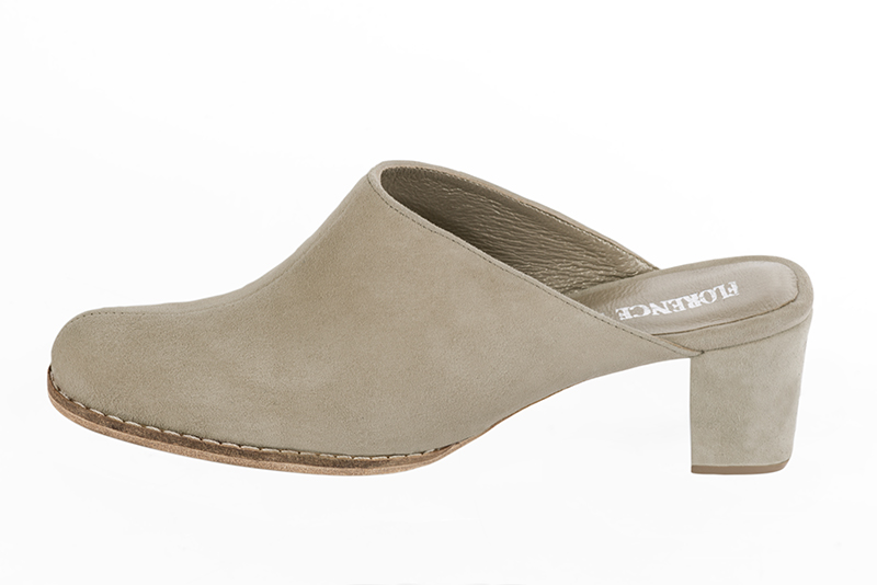 Off white women's clog mules. Round toe. Medium block heels. Profile view - Florence KOOIJMAN